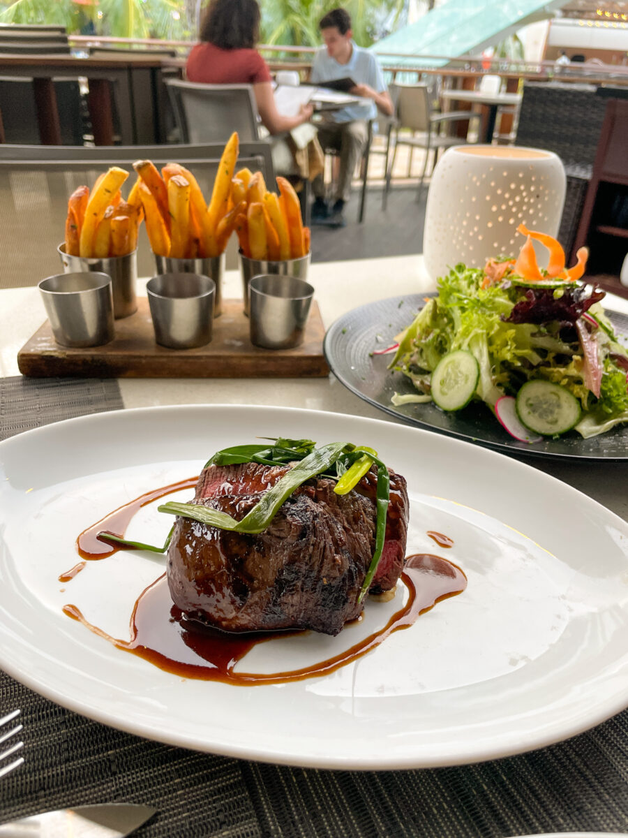 steak, french fries and salad