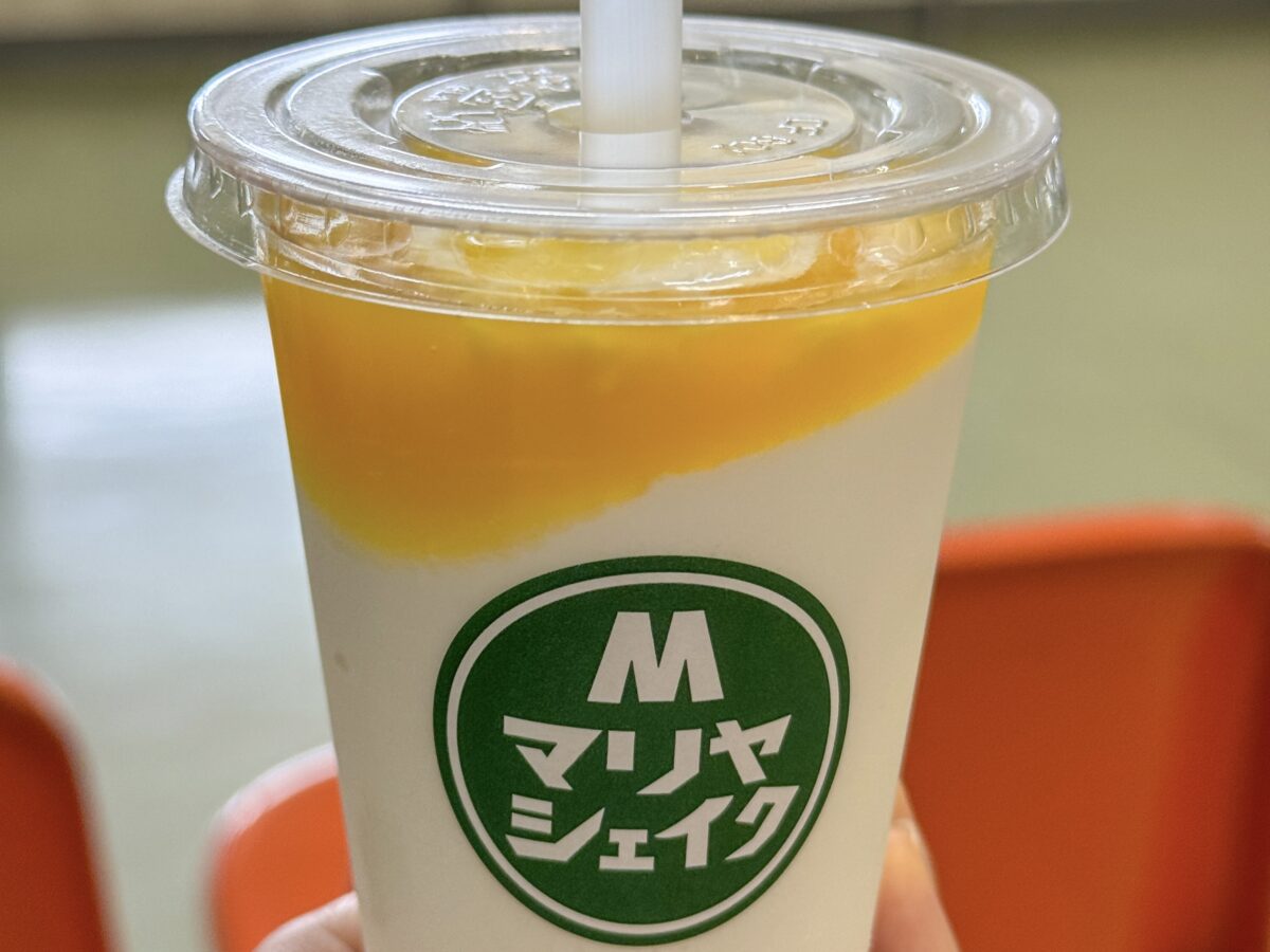 Photo of a shake topped with mango sauce